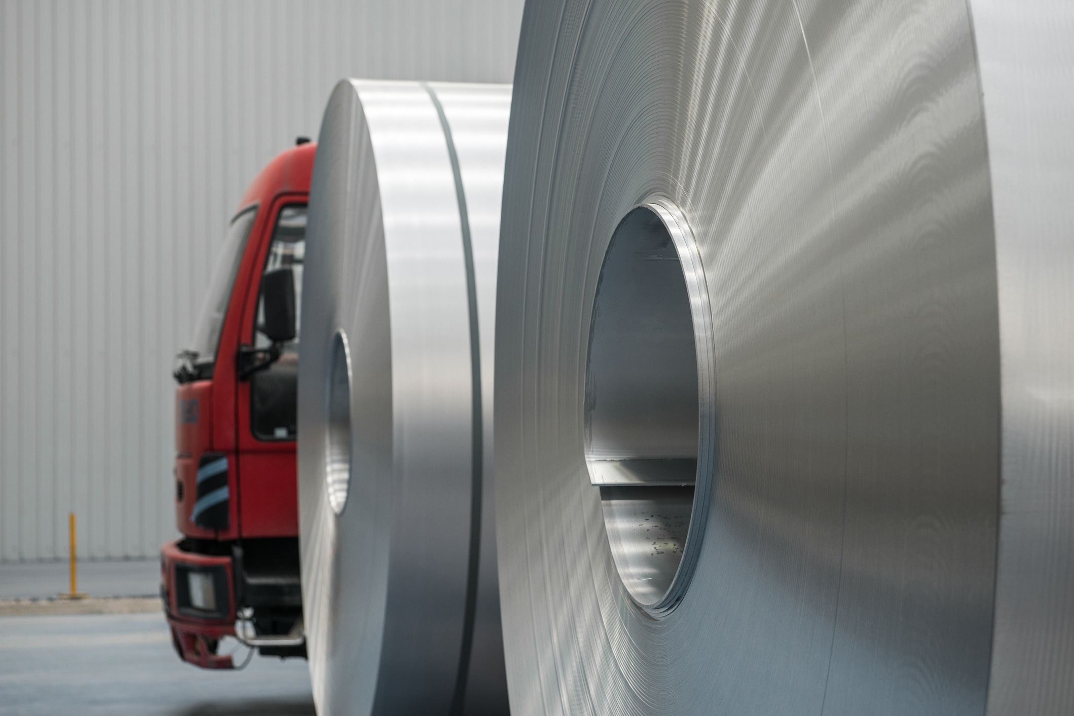 Rolls of aluminium ready for transportation in the factory
